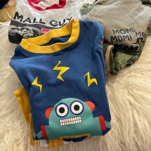 3 pair of toddler boy pajamas.